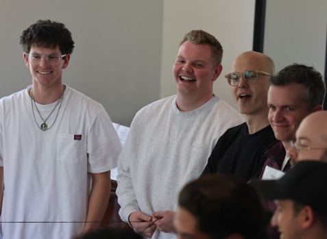 Participants laughing together during a session